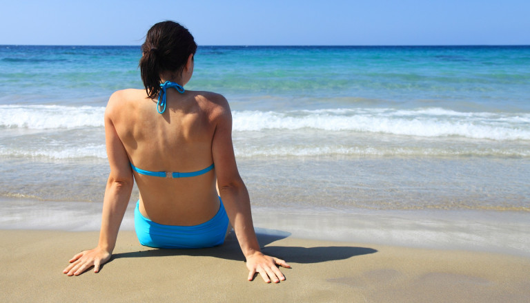 Frau am Strand