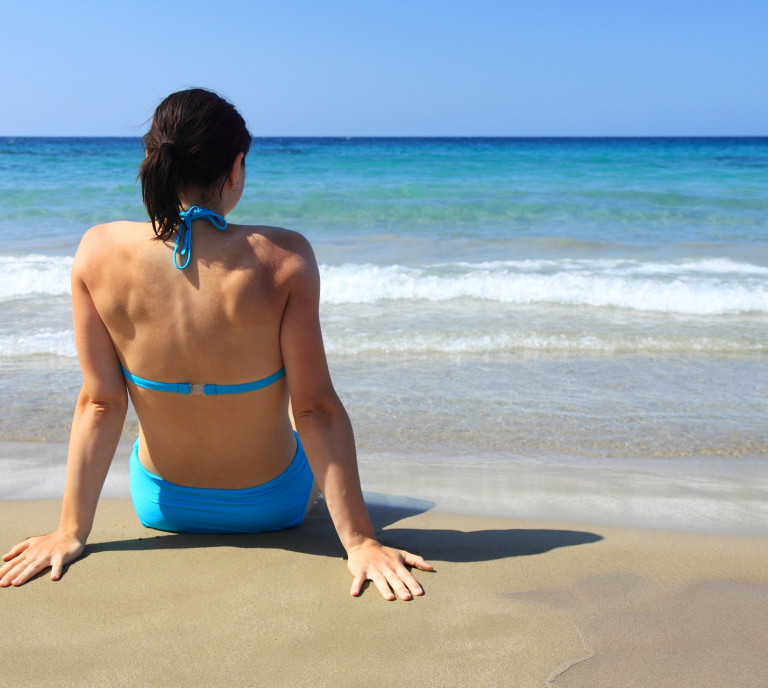 Frau am Strand