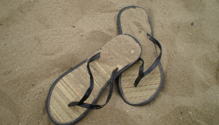 Flipflops im Sand