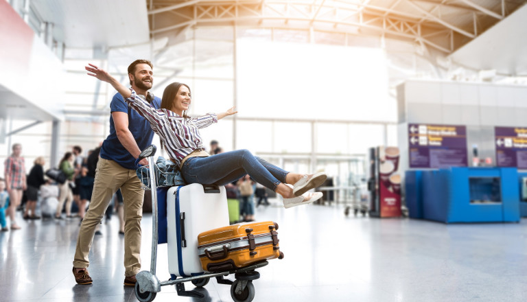 happy couple airport